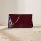 Astra bordo zarf clutch — travertin zeminde önden görünüm